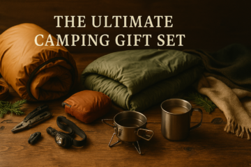 Rustic winter camping gift set displayed on a wooden table with a tent, sleeping bag, camp stove, warm mug, headlamp, blanket, and outdoor essentials arranged for a holiday gift guide.